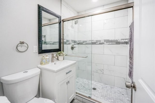 39120 Paradise Way, Cathedral City, CA 92234 - bathroom featuring an enclosed shower, vanity, and toilet