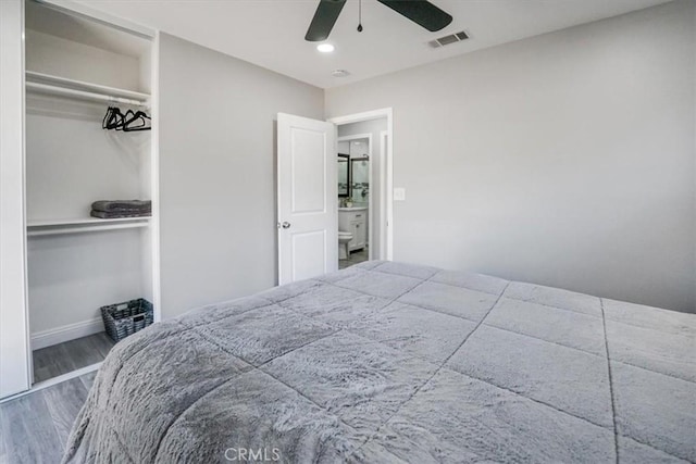 39120 Paradise Way, Cathedral City, CA 92234 - bedroom with hardwood / wood-style floors, ceiling fan, and a closet