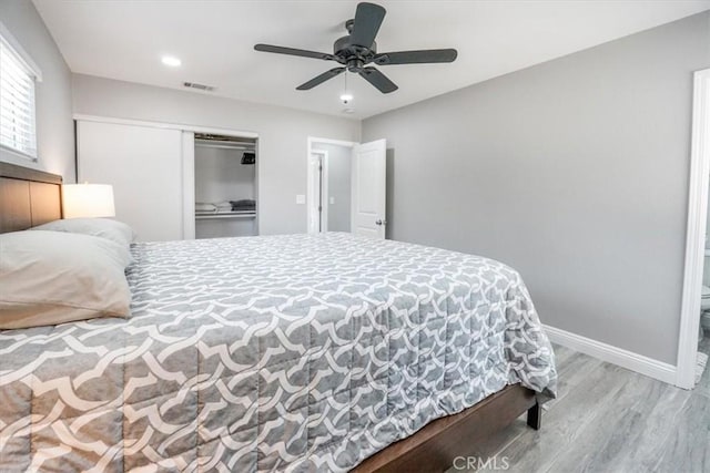 39120 Paradise Way, Cathedral City, CA 92234 - bedroom with ceiling fan, light wood-type flooring, and a closet