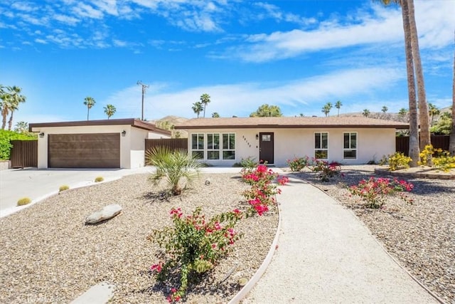 ranch-style home with a garage