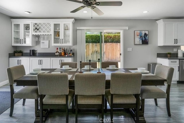 39120 Paradise Way, Cathedral City, CA 92234 - dining room featuring ceiling fan, bar, and dark hardwood / wood-style floors