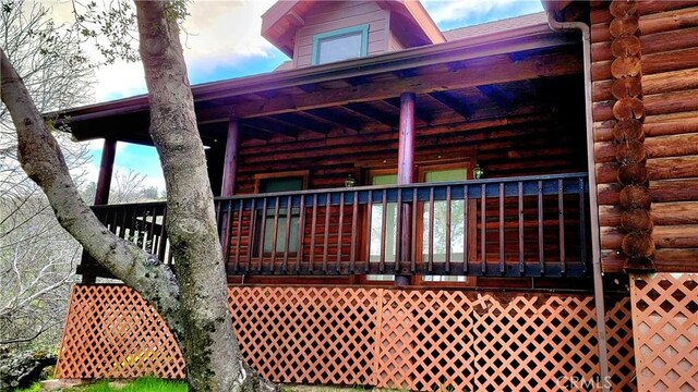 view of side of property featuring a porch