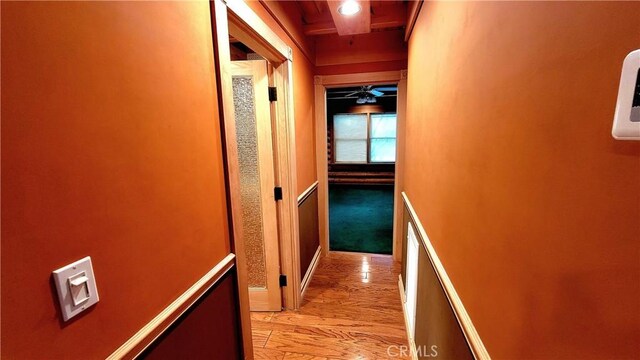 corridor featuring light hardwood / wood-style floors