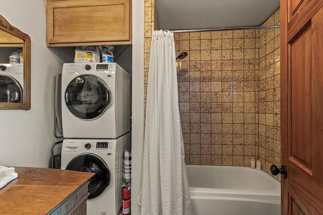 laundry area featuring stacked washer / dryer