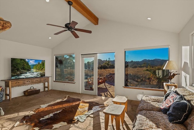 living room featuring beamed ceiling, ceiling fan, and high vaulted ceiling