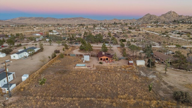 aerial view at dusk with a mountain view