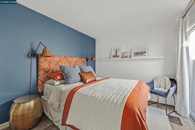 bedroom featuring light hardwood / wood-style flooring