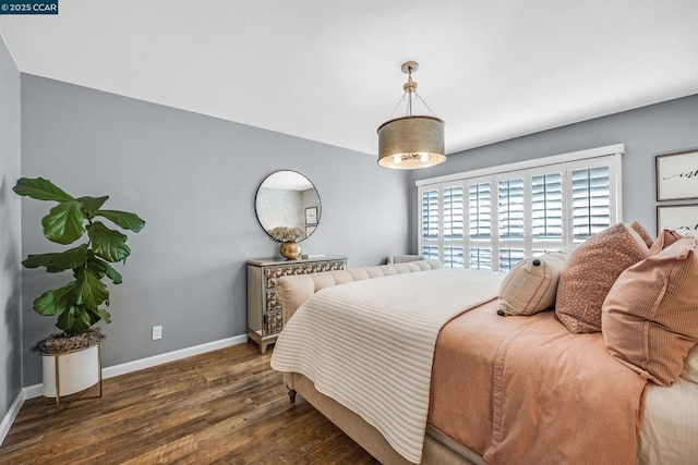 bedroom featuring dark wood-type flooring