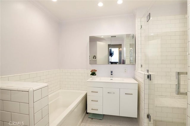 bathroom with vanity, tile patterned floors, ornamental molding, and shower with separate bathtub