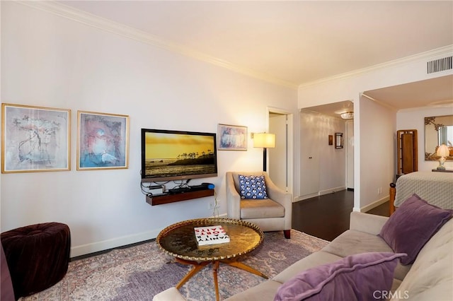 living room with ornamental molding and wood-type flooring