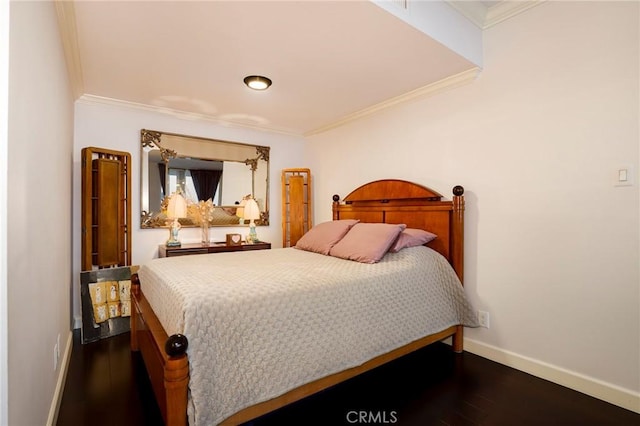 bedroom with dark wood-type flooring and ornamental molding