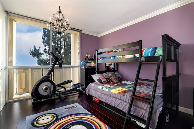 bedroom featuring dark wood-type flooring, ornamental molding, floor to ceiling windows, and a chandelier