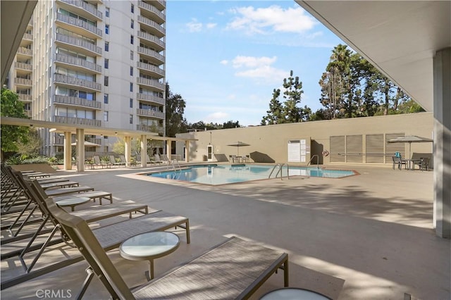 view of pool featuring a patio area