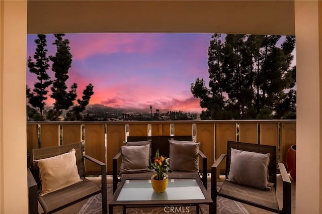 patio terrace at dusk with a balcony