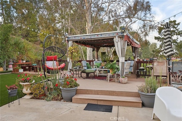 wooden deck featuring a gazebo