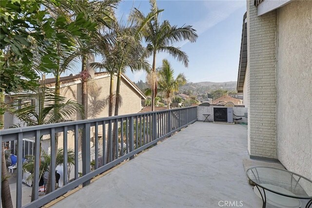 balcony featuring a mountain view