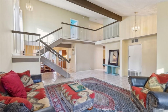 tiled living room featuring an inviting chandelier, high vaulted ceiling, and beamed ceiling