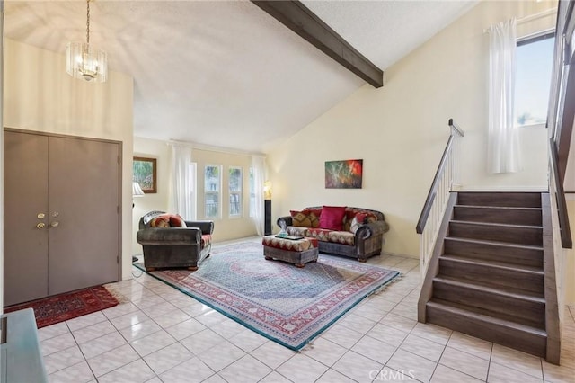 entrance foyer featuring an inviting chandelier, light tile patterned floors, high vaulted ceiling, and beamed ceiling