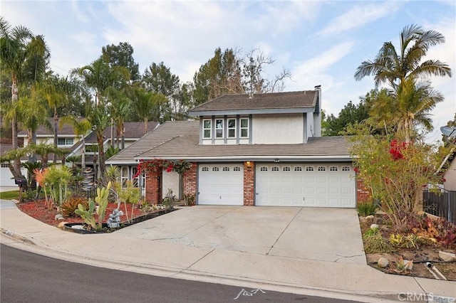 front of property with a garage