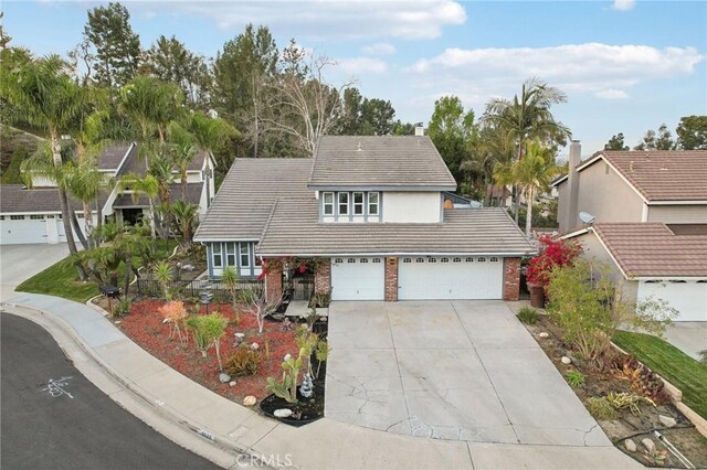 front of property with a garage