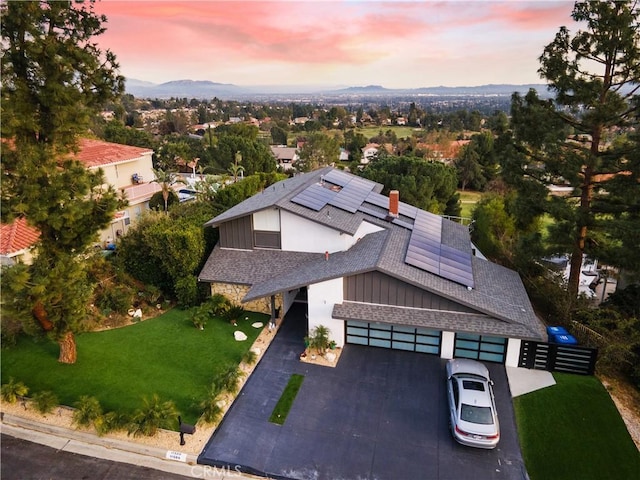 drone / aerial view featuring a mountain view