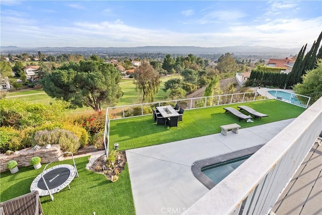 exterior space with a yard and fence