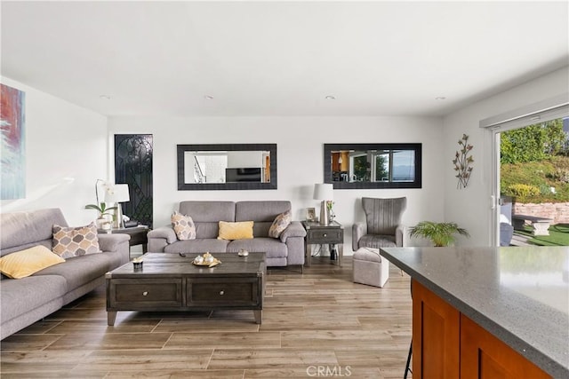 living area featuring light wood-style flooring