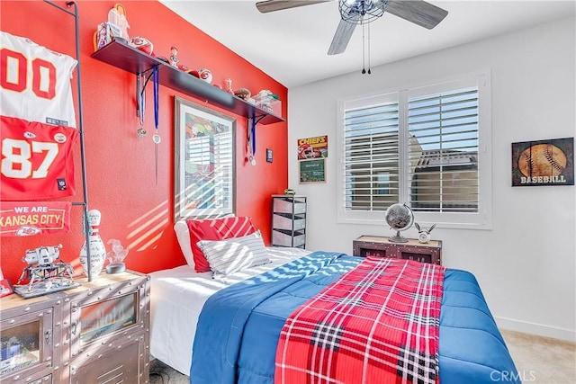 carpeted bedroom with ceiling fan