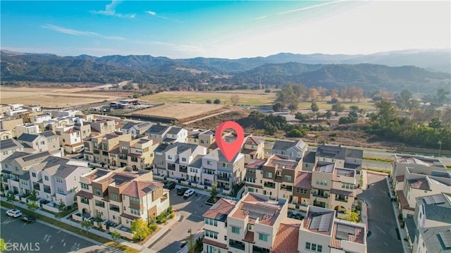 drone / aerial view featuring a mountain view