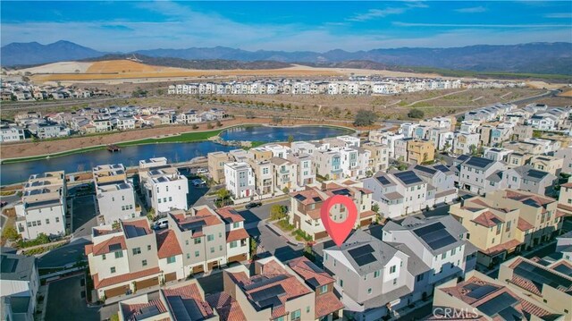 aerial view with a water and mountain view