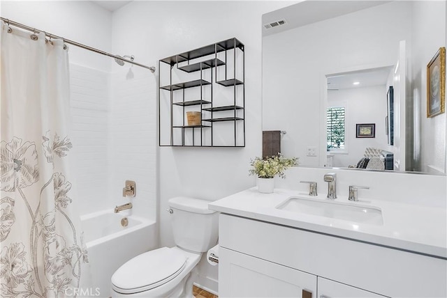 full bathroom featuring toilet, vanity, and shower / bathtub combination with curtain