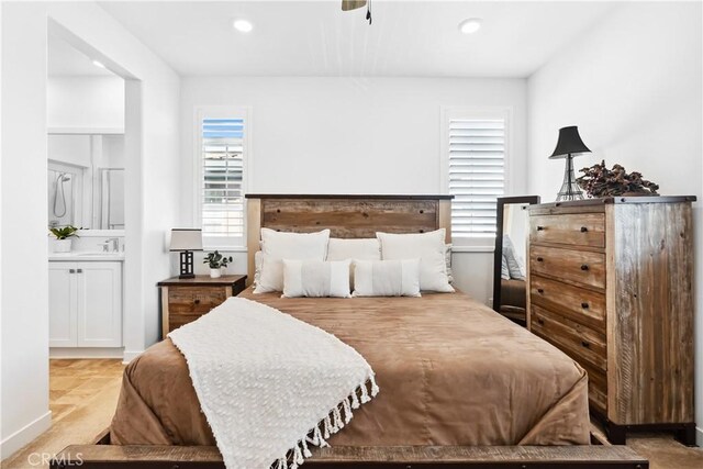 92 Juniper Dr, Rancho Mission Viejo, CA 92694 - bedroom featuring a sink, ensuite bath, and recessed lighting