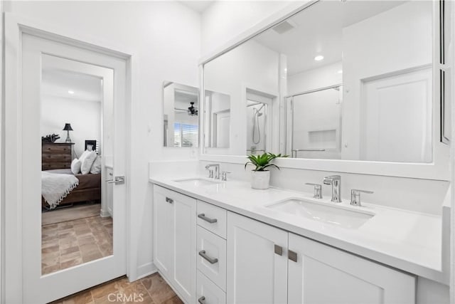 92 Juniper Dr, Rancho Mission Viejo, CA 92694 - ensuite bathroom with a shower stall, double vanity, a sink, and a ceiling fan