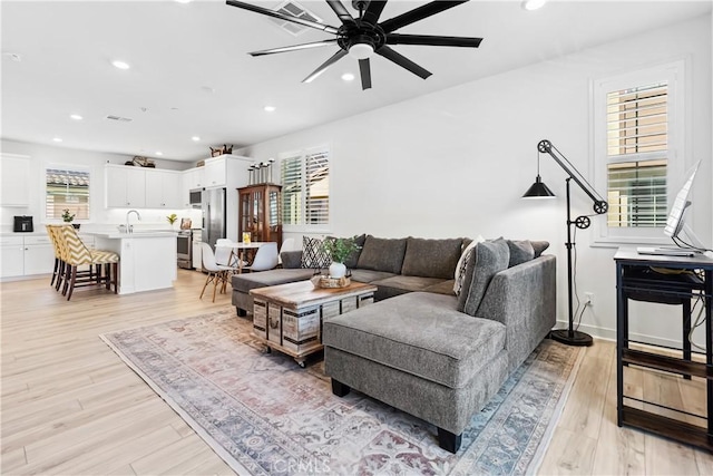 92 Juniper Dr, Rancho Mission Viejo, CA 92694 - living area featuring recessed lighting, light wood-style flooring, and a ceiling fan
