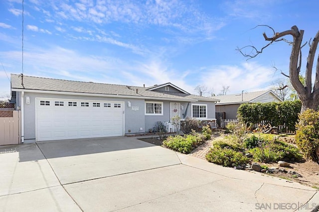 ranch-style home with a garage