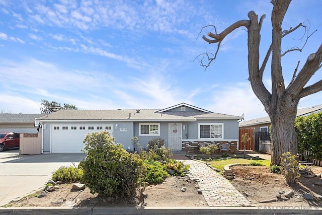 single story home featuring a garage