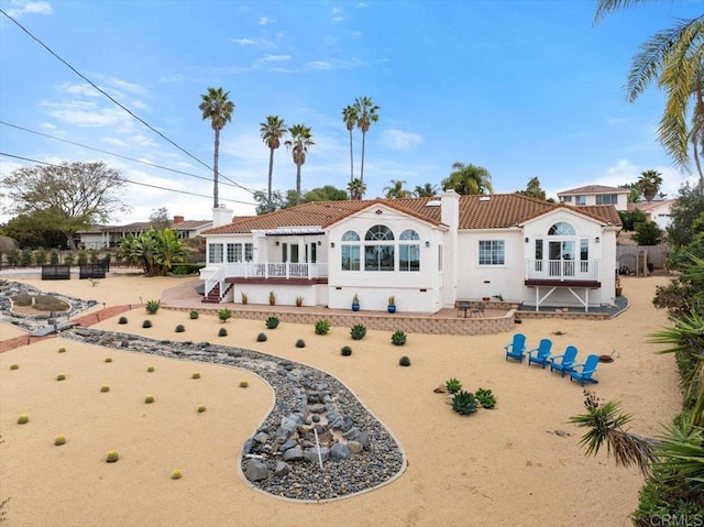 back of house featuring a patio