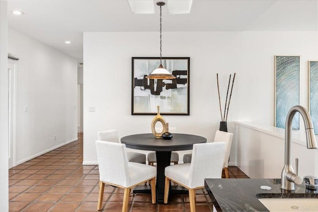 tiled dining area with sink