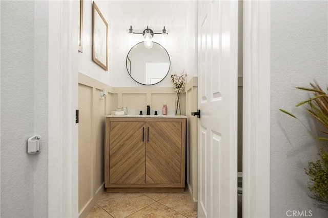 bathroom with vanity and tile patterned floors