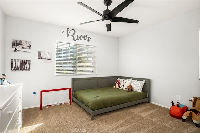 bedroom with ceiling fan and carpet flooring