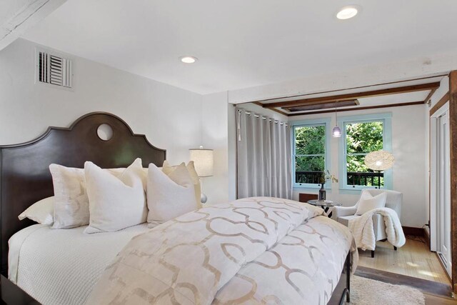 bedroom featuring hardwood / wood-style flooring