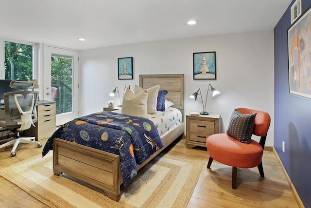 bedroom featuring light hardwood / wood-style floors