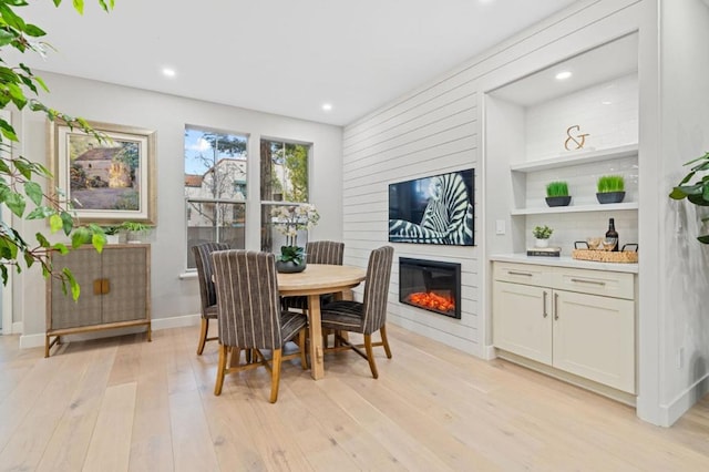 dining room with light hardwood / wood-style floors