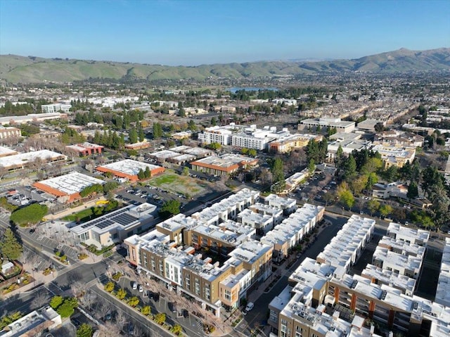 drone / aerial view featuring a mountain view