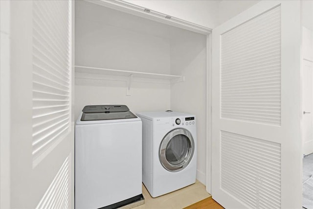 laundry area featuring washing machine and dryer