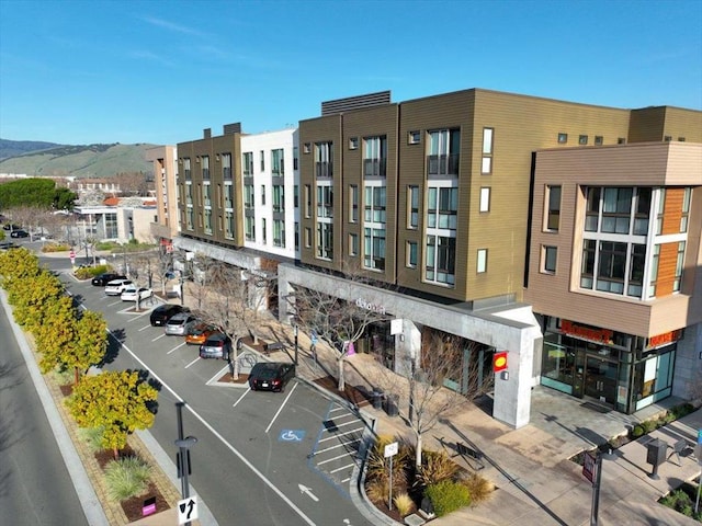 view of building exterior with a mountain view