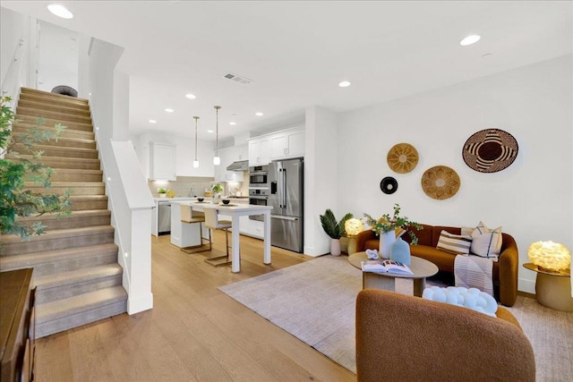 living room featuring light hardwood / wood-style flooring