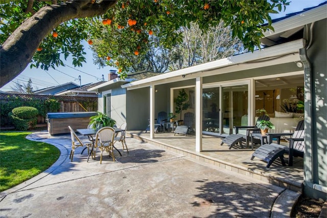 view of patio with a hot tub