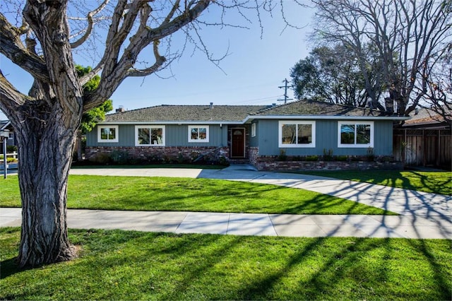 ranch-style house with a front yard