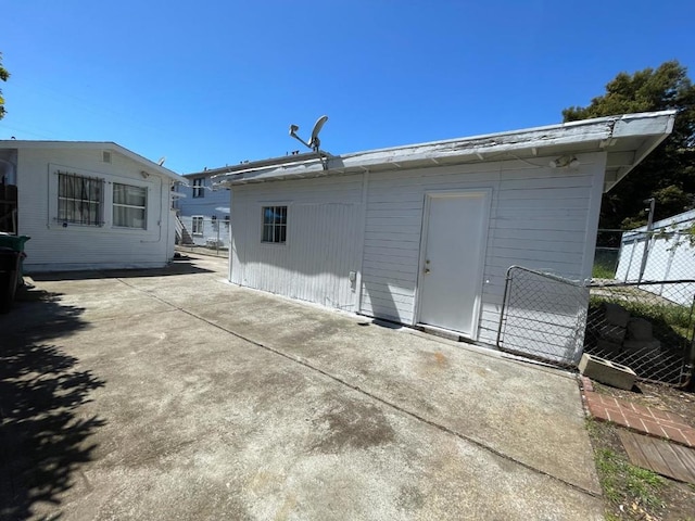 back of property featuring a patio area